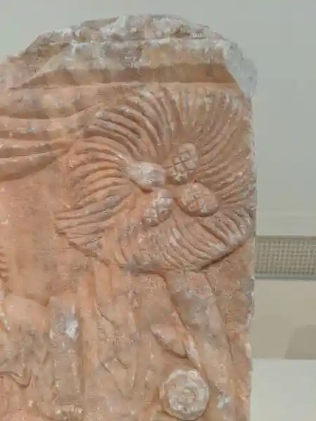 Marble relief of Rhea-Cybele enthroned with Attis from a taurobolic altar